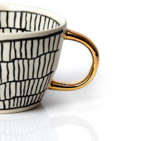 Goldene Tasse