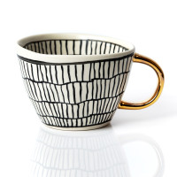 Goldene Tasse